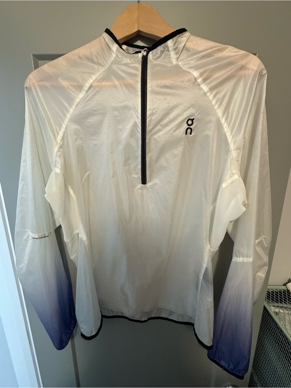 On Running Women’s White Hooded Windbreaker with Blue Ombre Sleeves